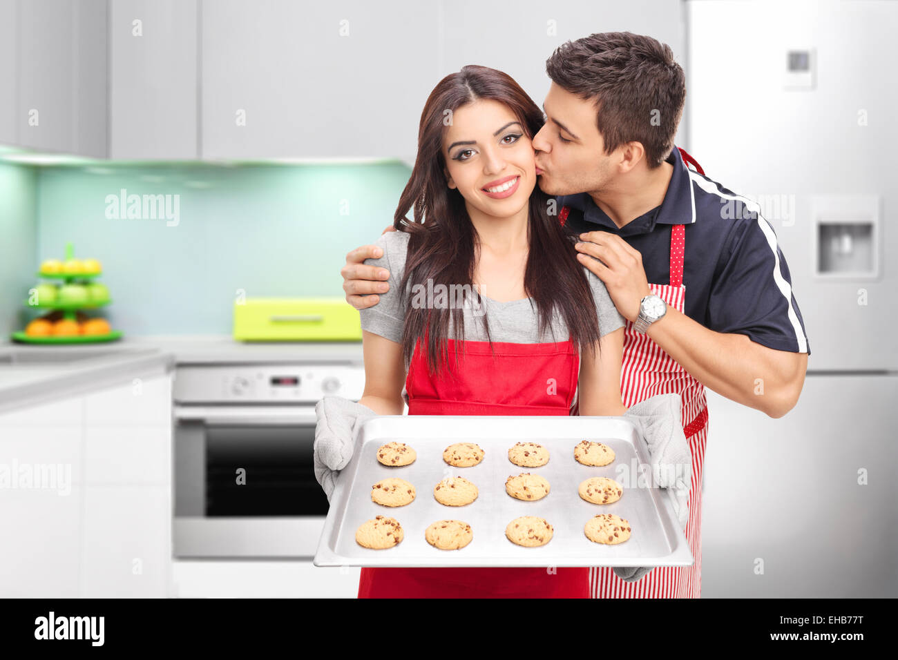 Young couple baking cookies in the kitchen at home Stock Photo Alamy