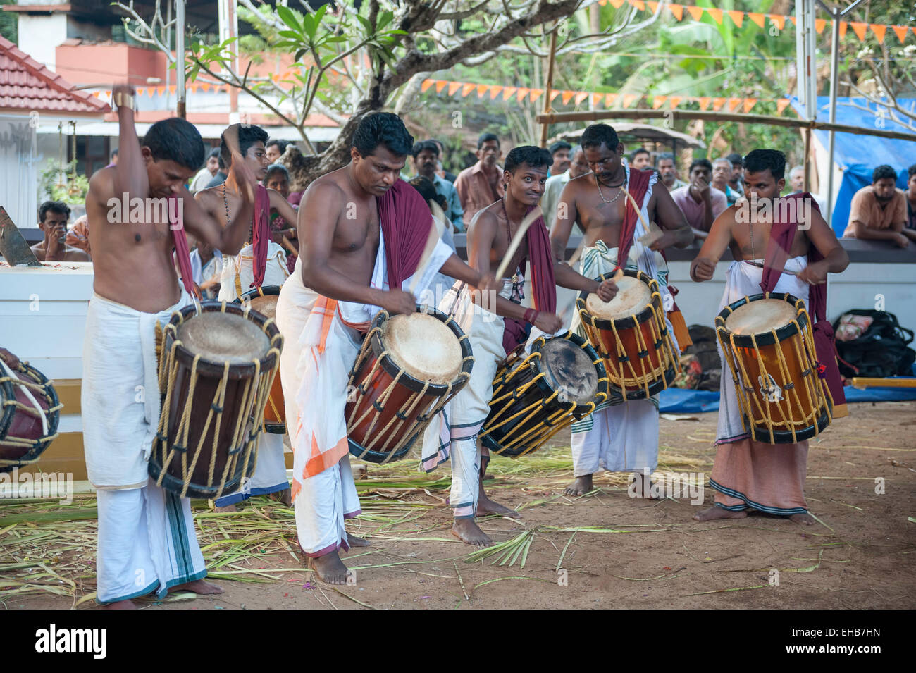 Drummers in temple during Theyyam performance Stock Photo - Alamy