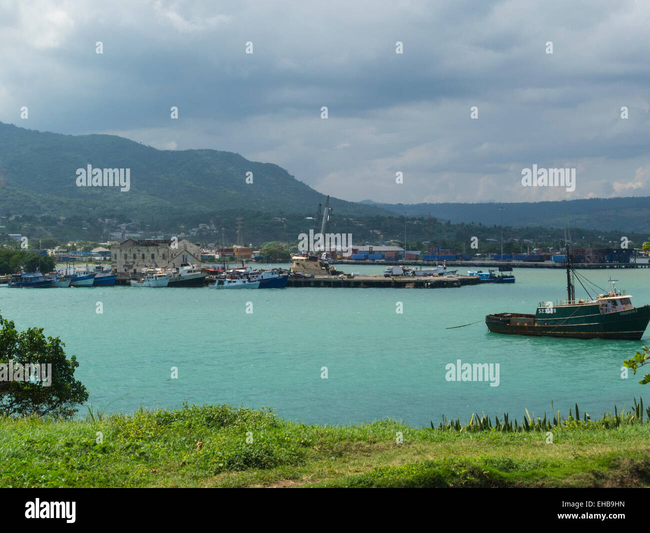 View to Puerto Plata port with moored fishing boats Dominican Republic located in San Felipe de Puerto Plata main northern port cargo operations Stock Photo