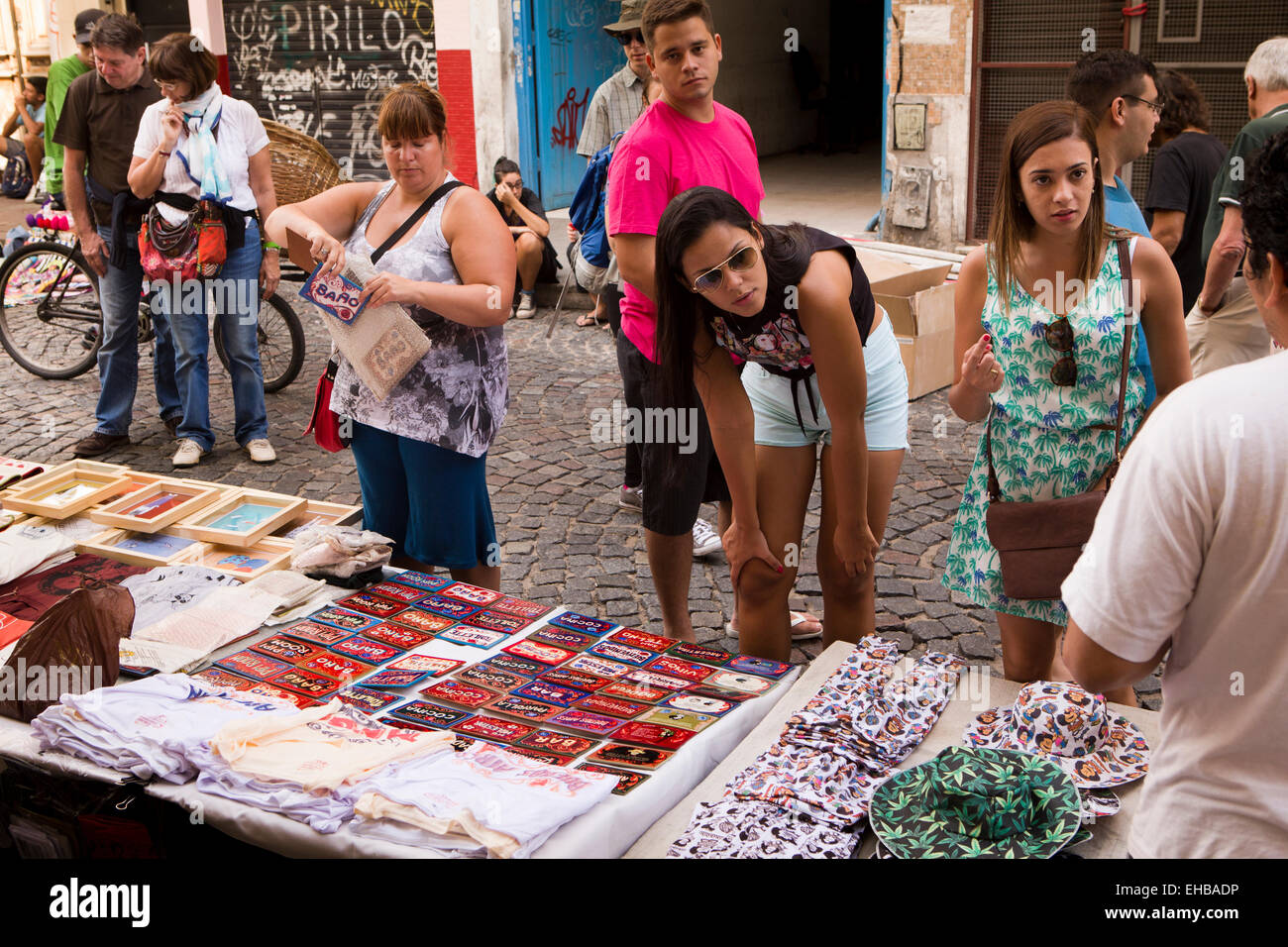 Argentina, Buenos Aires, San Telmo market, female customers at painted name sign stall Stock Photo