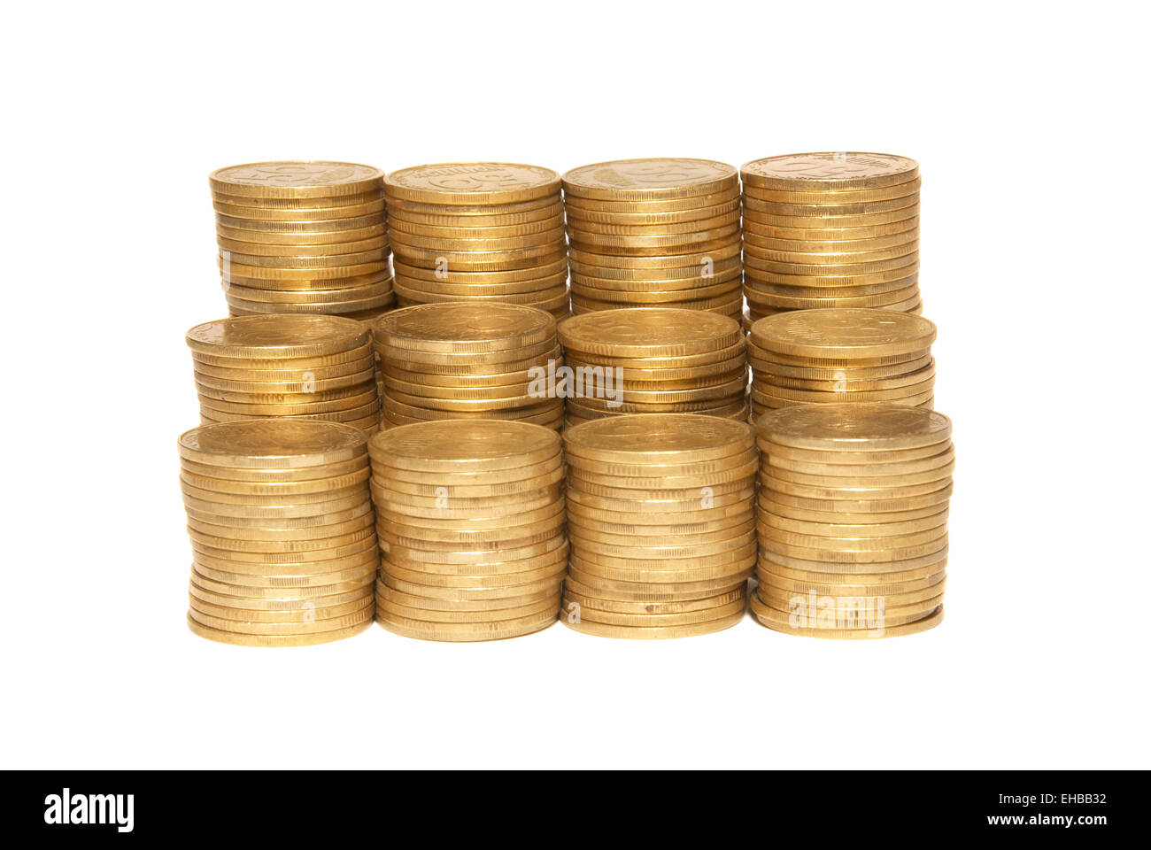 Stack of golden coins isolated on white Stock Photo - Alamy