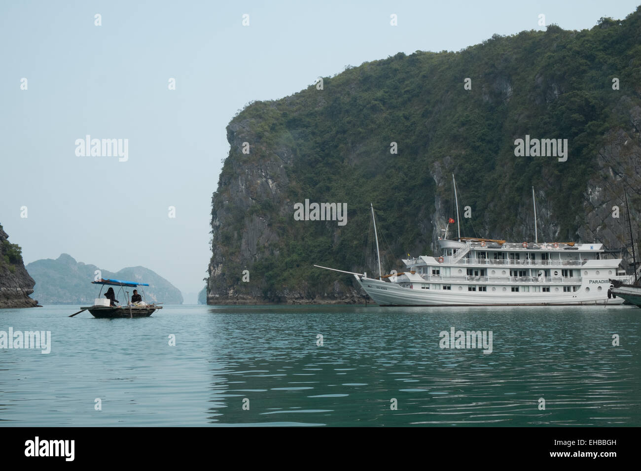 Huge,luxury tourist boat, karst limestone mountains at Cat Ba National