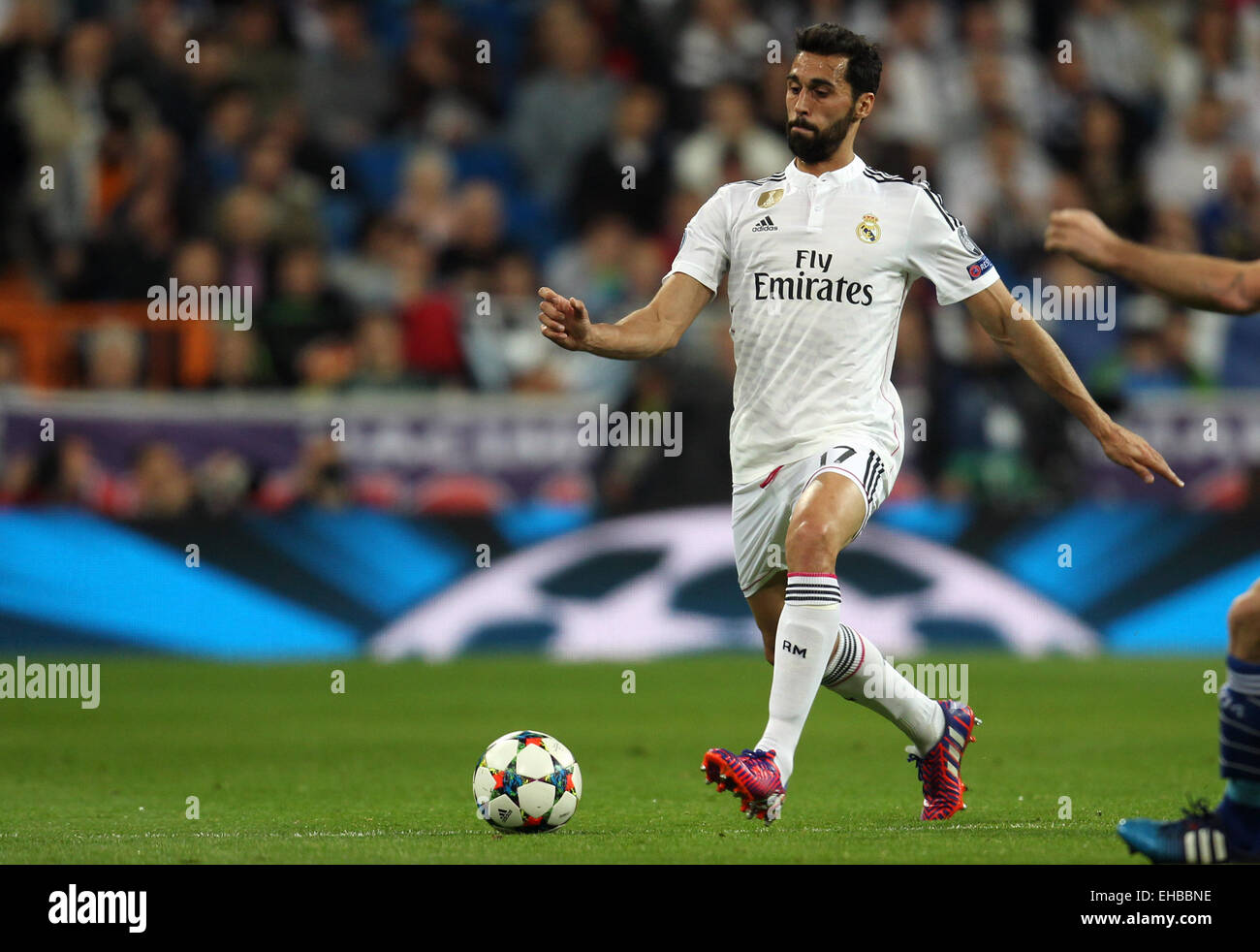 Madrid, Spain. 10th Mar, 2015. Real Madrid's Alvaro Arbeloa kicks a ball during the UEFA Champions League Round of 16 second leg soccer match at Santiago Bernabeu Stadium in Madrid, Spain, 10 March 2015. Photo: Ina Fassbender/dpa/Alamy Live News Stock Photo