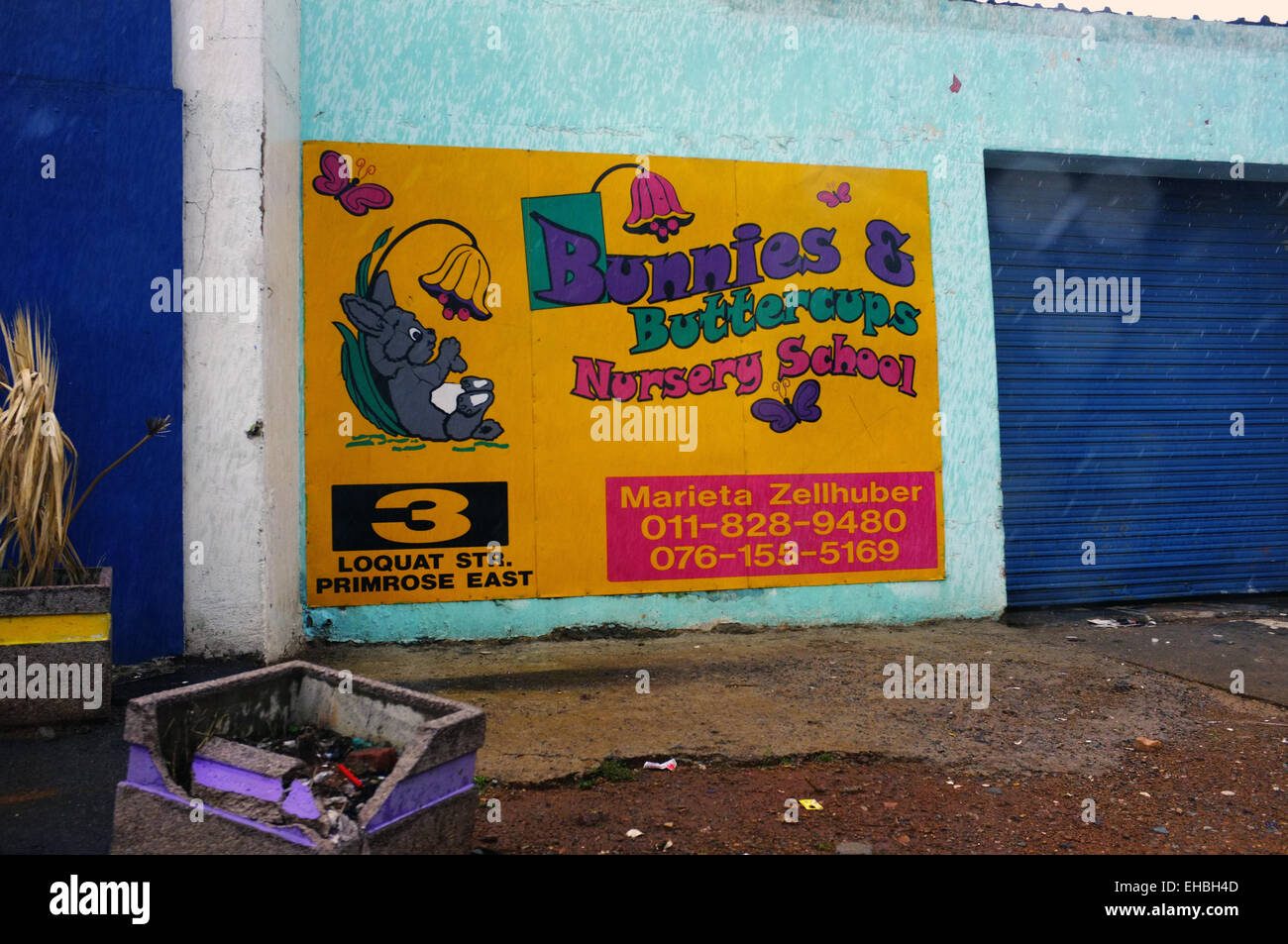 An advert for a nursery school on a building in Johannesburg Stock Photo Alamy