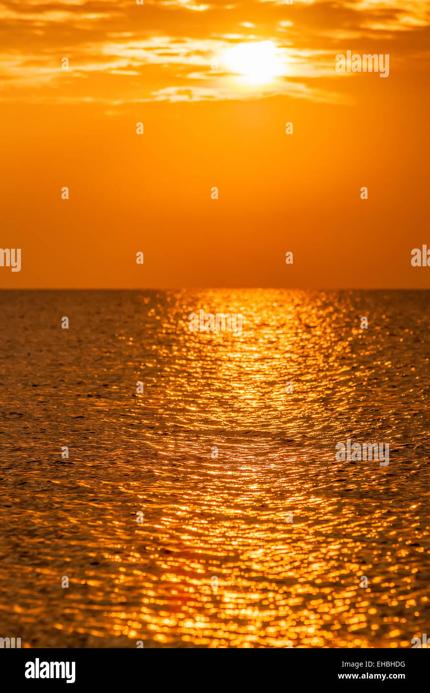 sunset at the beach Stock Photo - Alamy