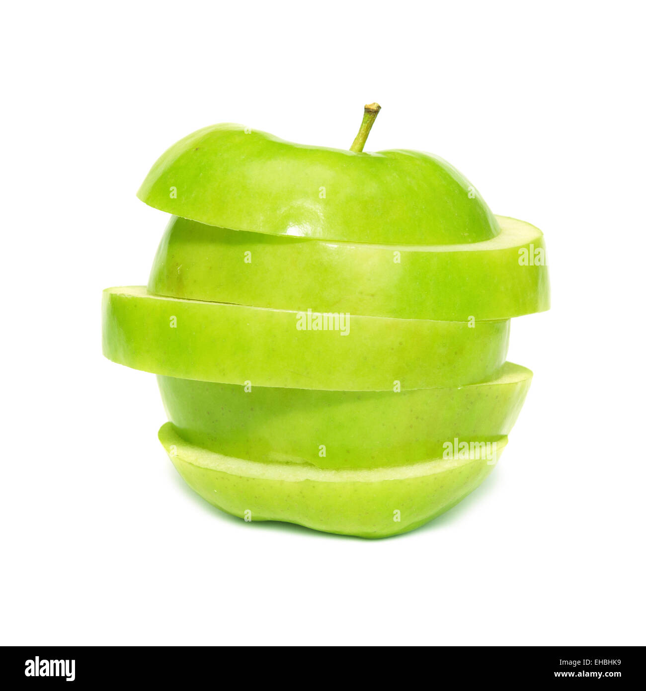 Sliced green apple isolated on white background Stock Photo - Alamy