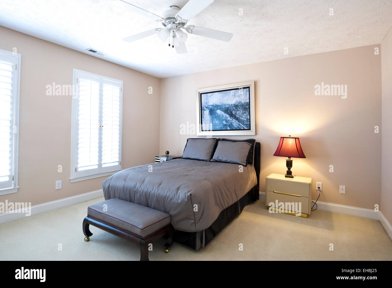 A modern Residential Furnished Guest Bedroom in a single family house Stock Photo