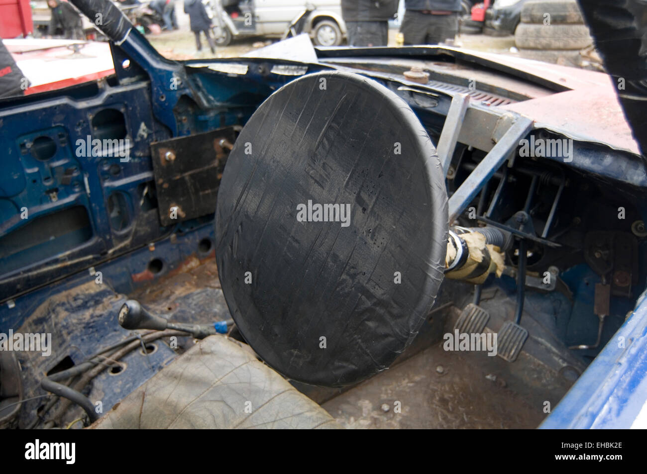 taped over steering wheel in demo derby car done so the driver doesn't