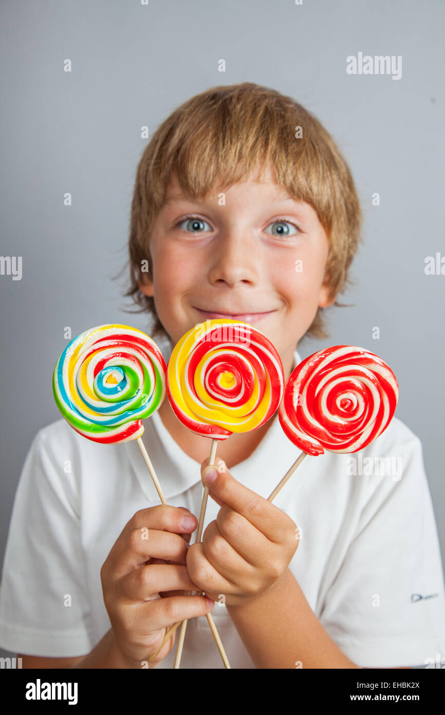 child boy eating lollipop Stock Photo