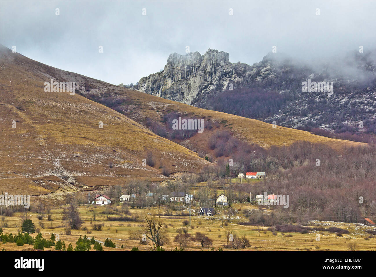 Velebit mountain village in fog Stock Photo