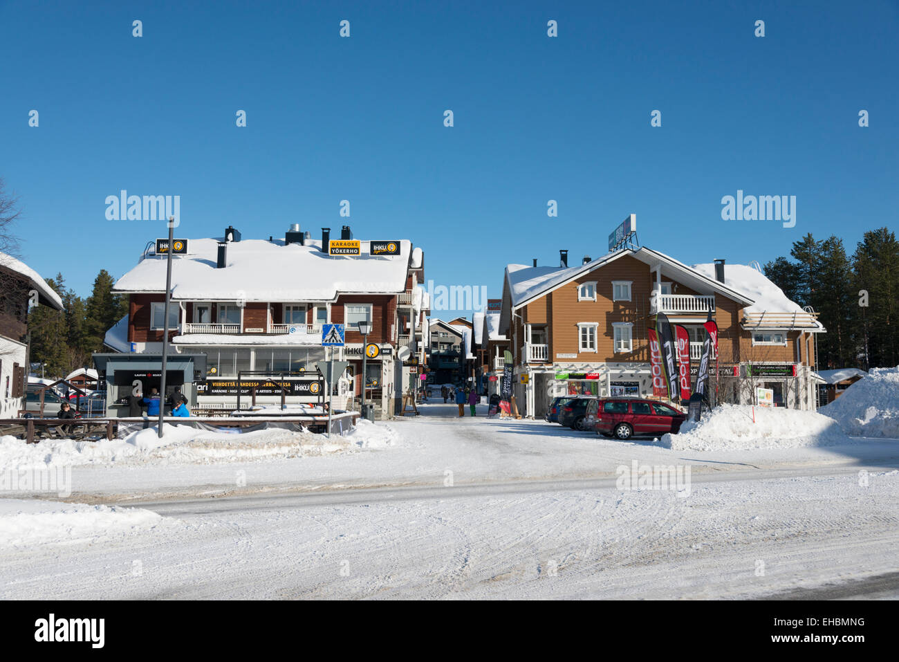 A street with houses and shops in the ski resort of Levi Lapland Finland in winter with snow on
