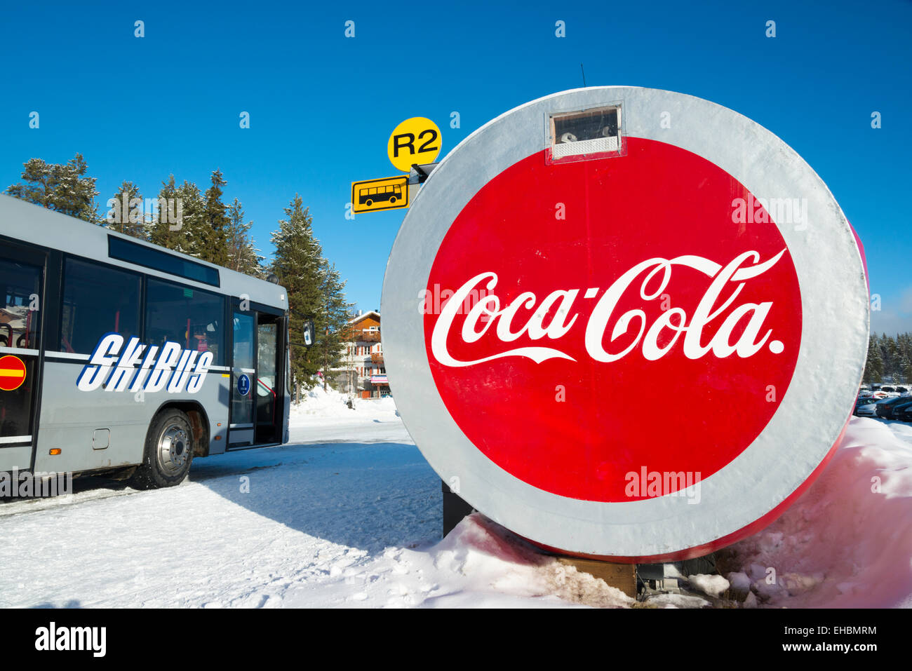 A coca cola advertisement built into a ski bus stop in the ski resort Stock  Photo - Alamy