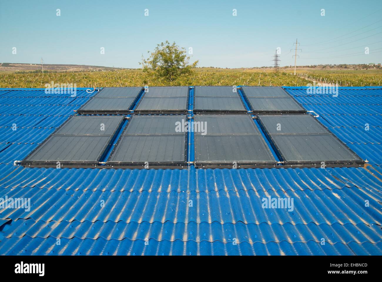 Solar water heating system on the house roof Stock Photo - Alamy