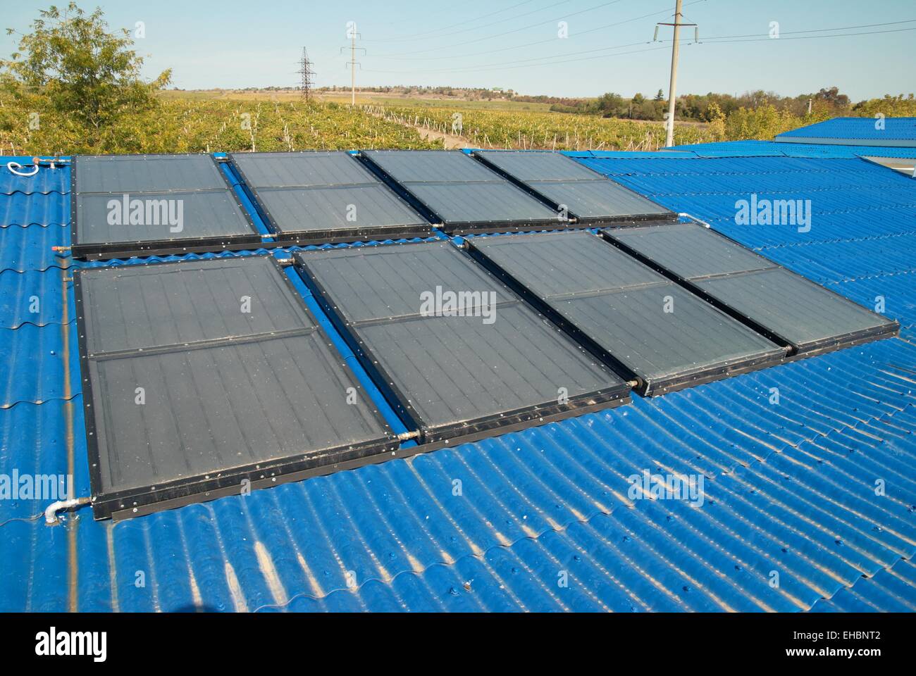 Solar water heating system on the house roof Stock Photo - Alamy