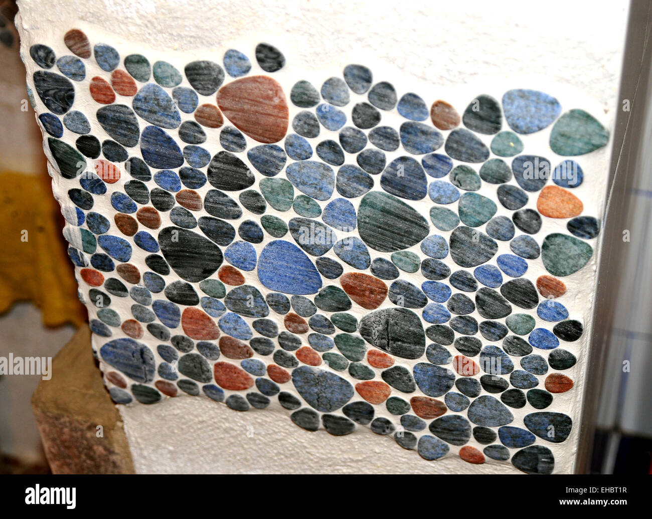 Grouting tile mosaic Stock Photo