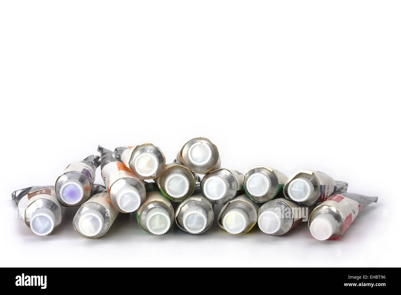 a lot of paint tubes on white background Stock Photo