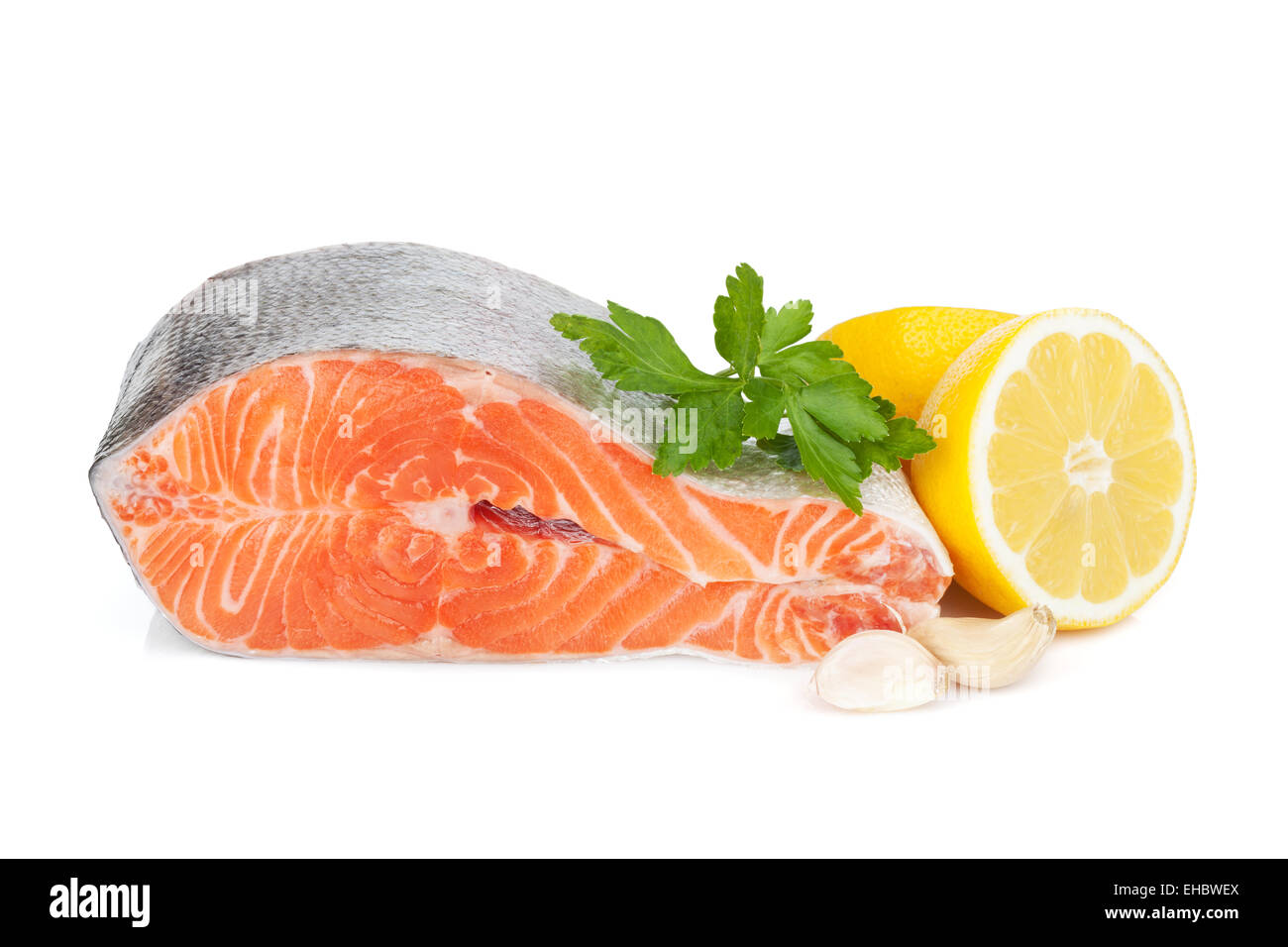 Salmon with herbs and lemon. Isolated on white background Stock Photo ...