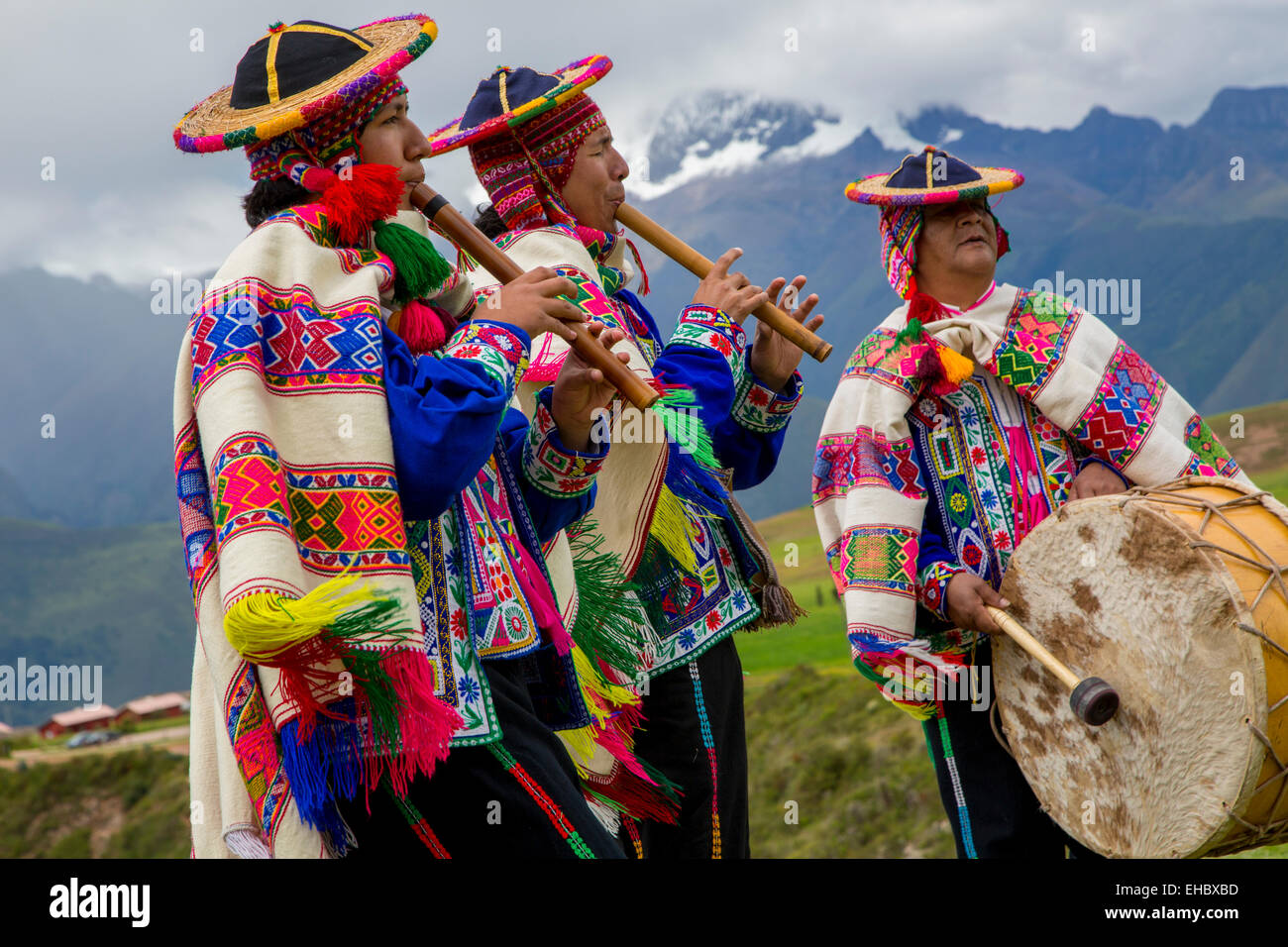 Traditional Inca Dancers in costume, Inca terraces of Moray,  Cusco Region, Urubamba Province, Machupicchu District, Peru Stock Photo