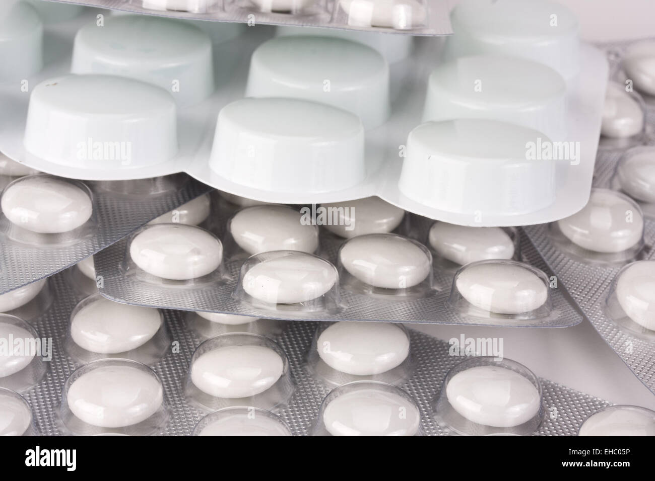 white pills in blister package isolated Stock Photo