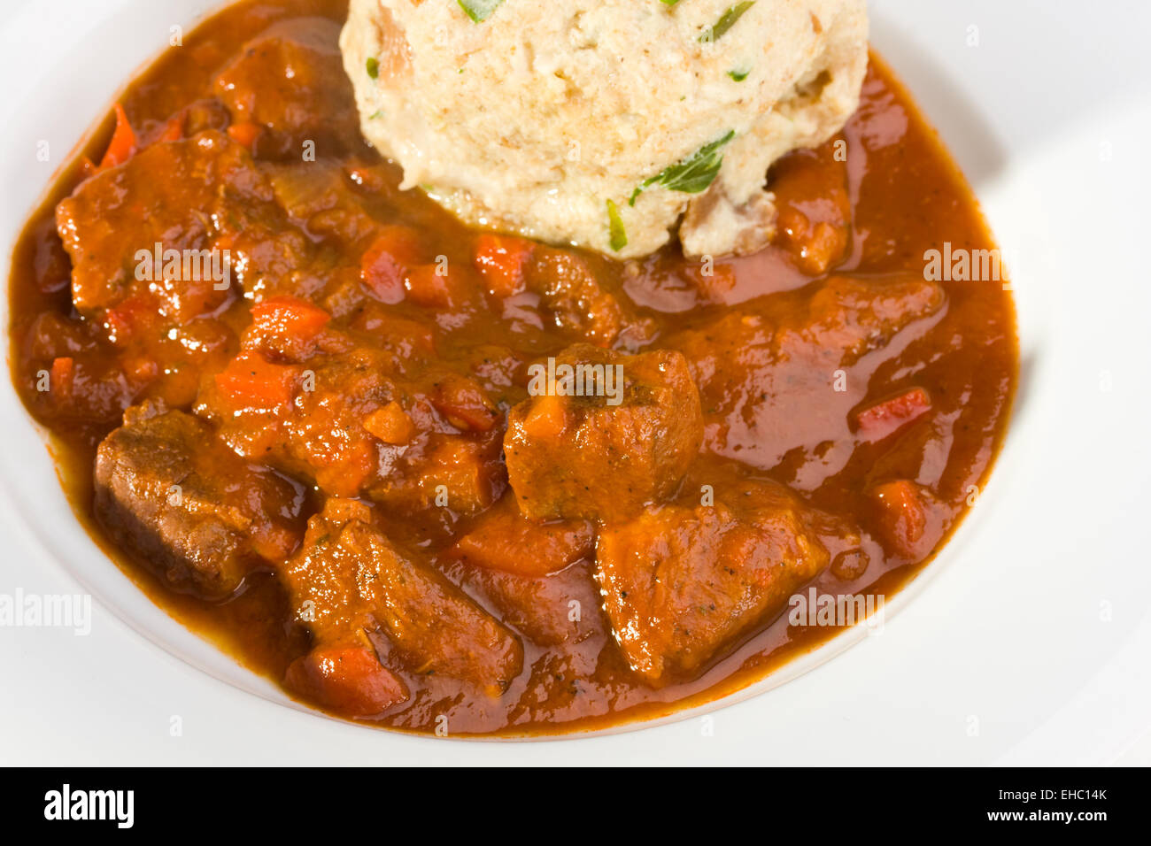 hungarian goulash and a bread dumpling Stock Photo Alamy