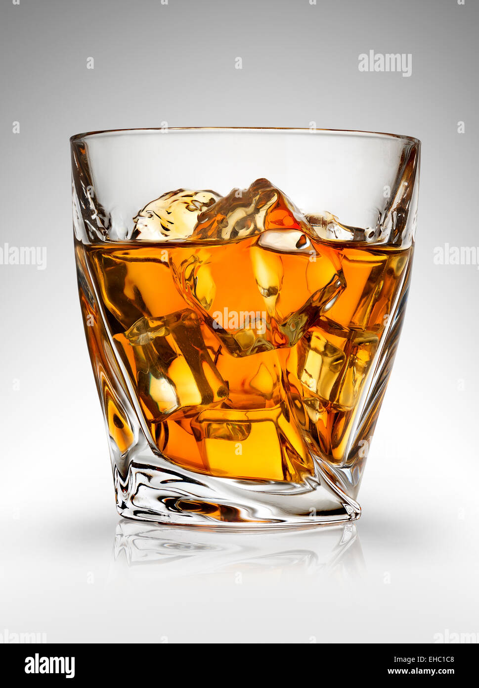 Glass of whiskey on a gray background Stock Photo