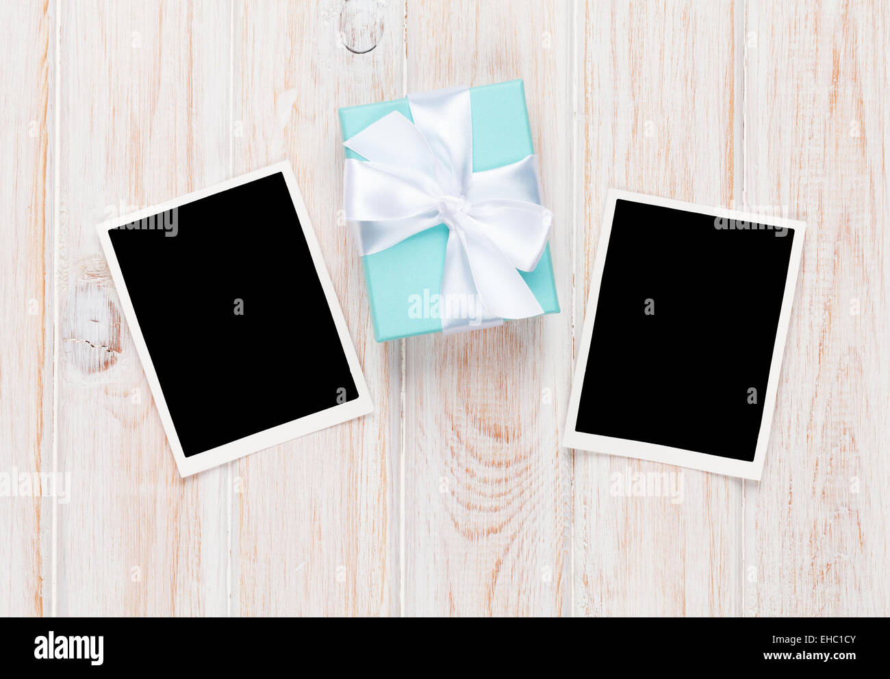 Gift box and blank photo frames hi-res stock photography and images - Alamy