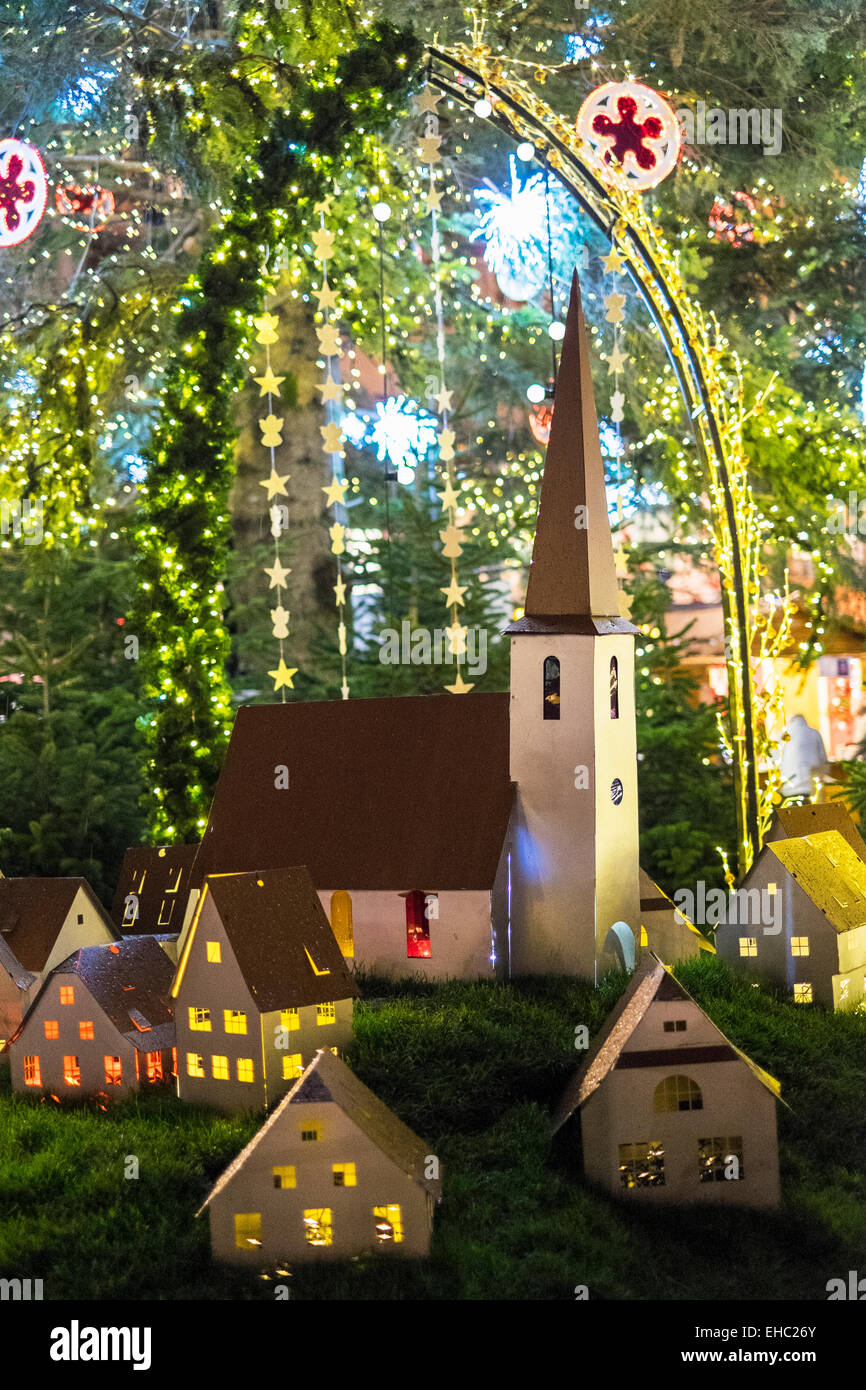 Village model under giant Christmas tree Strasbourg Alsace France Europe Stock Photo