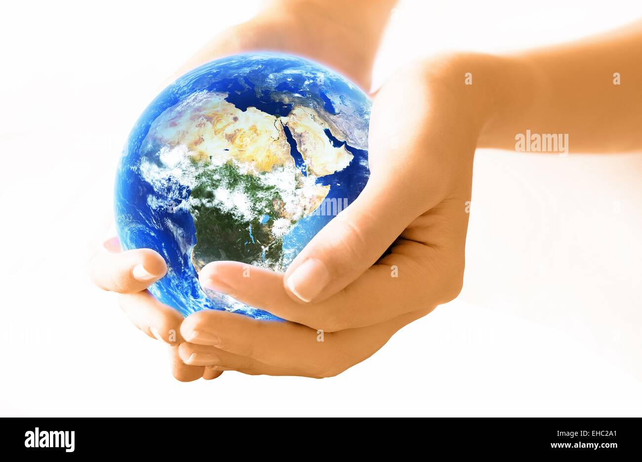 Hands Holding Planet Earth female hands holding planet earth Stock Photo