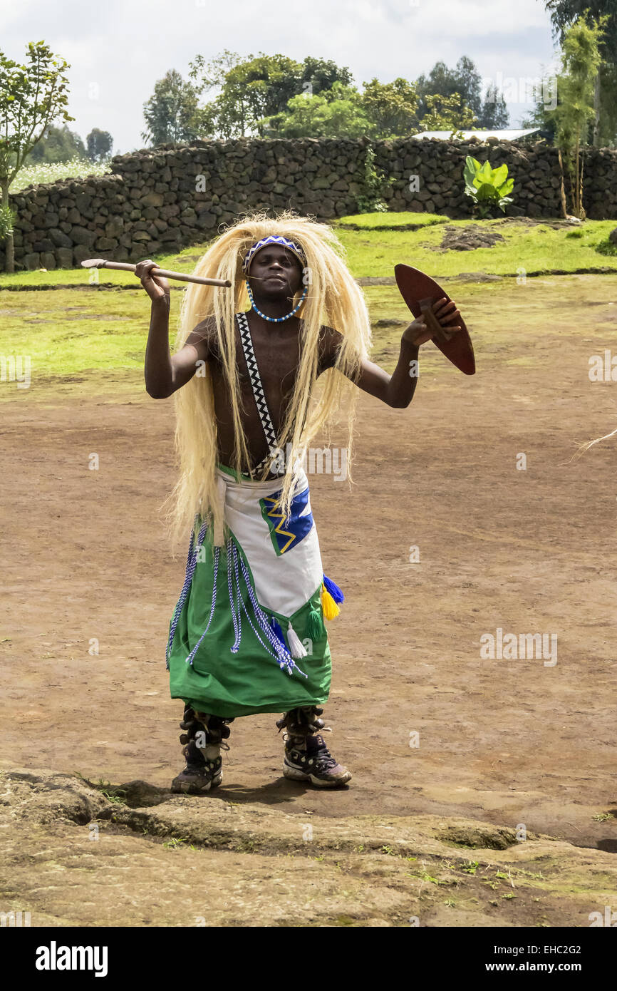 MUSANZE, RWANDA - NOVEMBER 5, 2013: Tribal Dancers of the Batwa Tribe Perform Traditional Intore Dance to Celebrate the Birth of Stock Photo