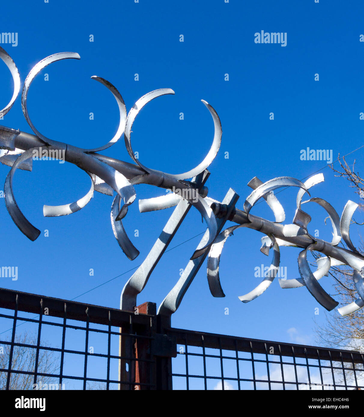 Anti Climb Barrier On Top of Factory Gates, UK Stock Photo