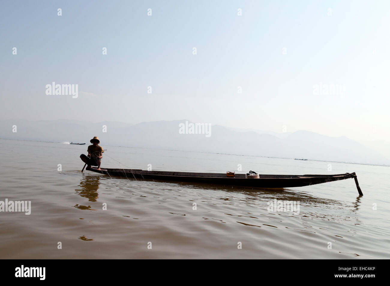 Lone fisherman at sunrise, Inle Lake, Myanmar ( Burma ), Asia Stock Photo