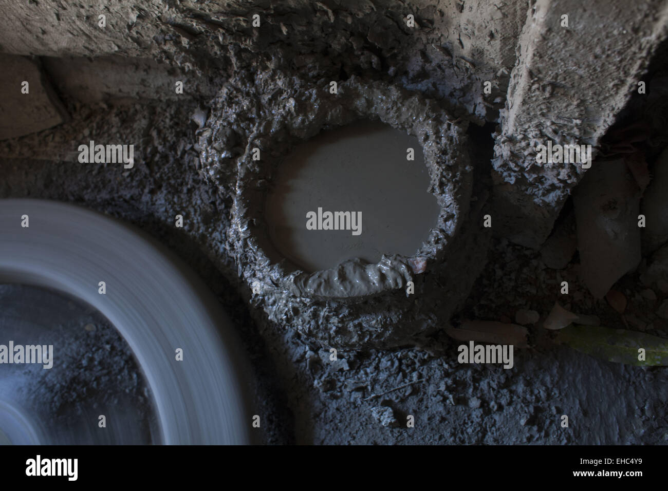 Dhaka, Bangladesh. 11th Mar, 2015.Potter making pots using clay near