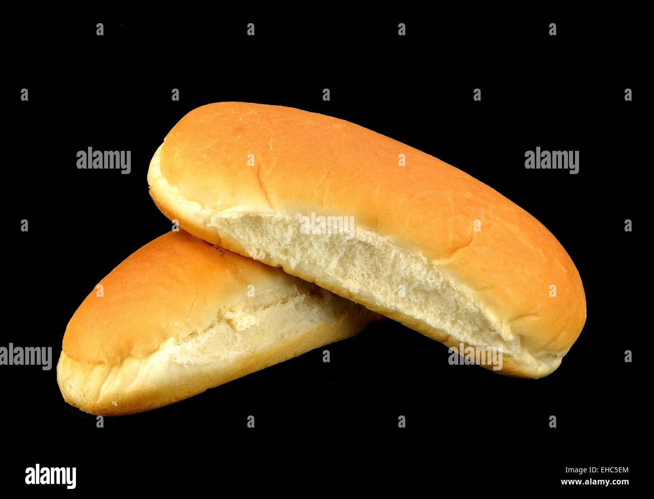 Hot dog buns on a black background Stock Photo Alamy