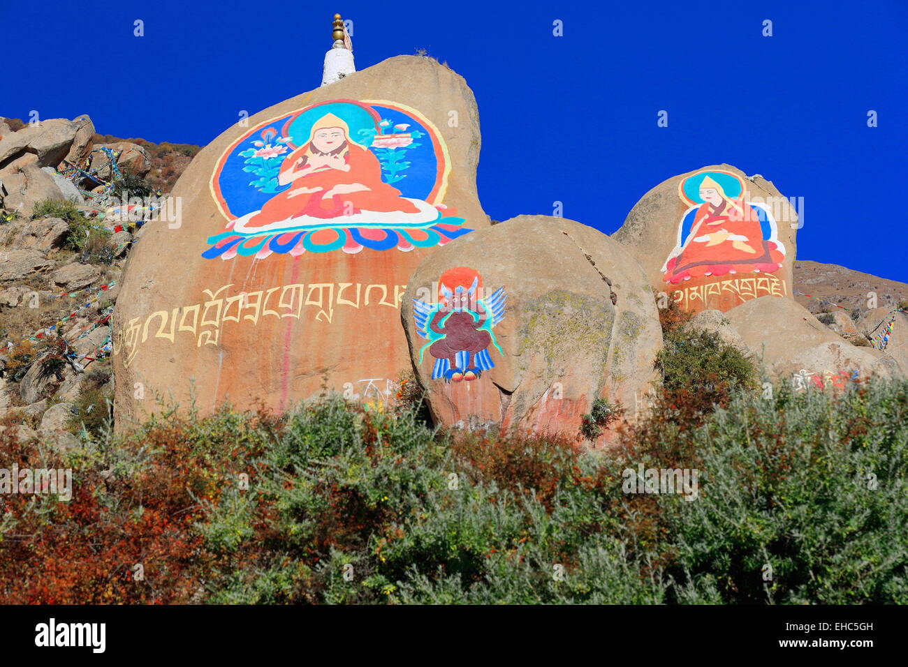 Tibetan buddhist paintings on mani stones om mani padme hum in the