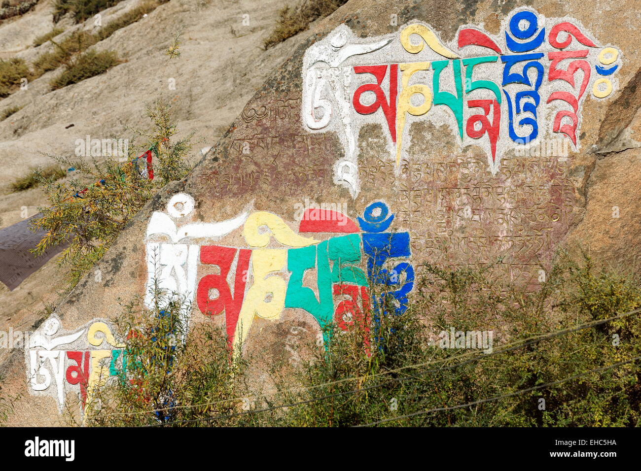 Tibetan buddhist paintings on mani stones om mani padme hum in the