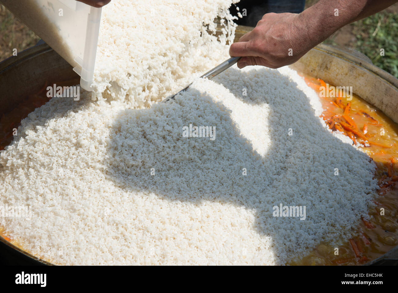 Preparation of mutton pilaf - Uzbek national meal of mutton, rice ...