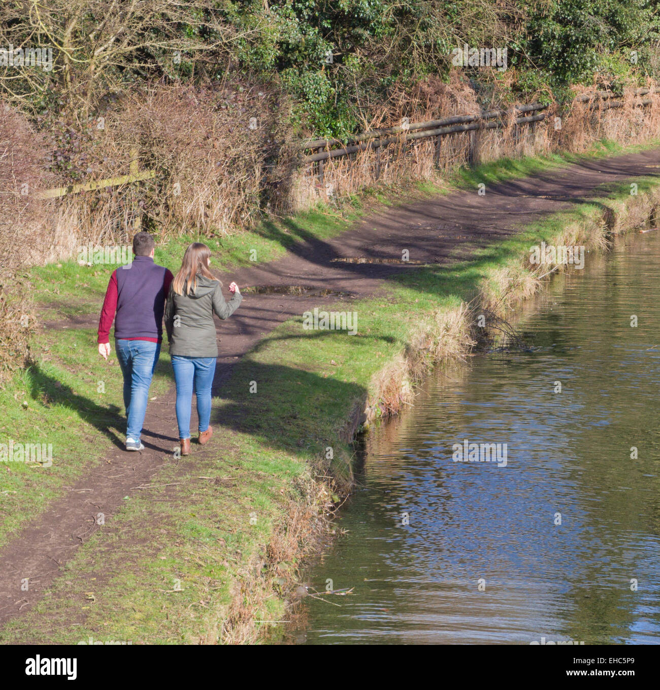 Young Caucasian Couple Waliking Along Stourbridge Canal Towpath