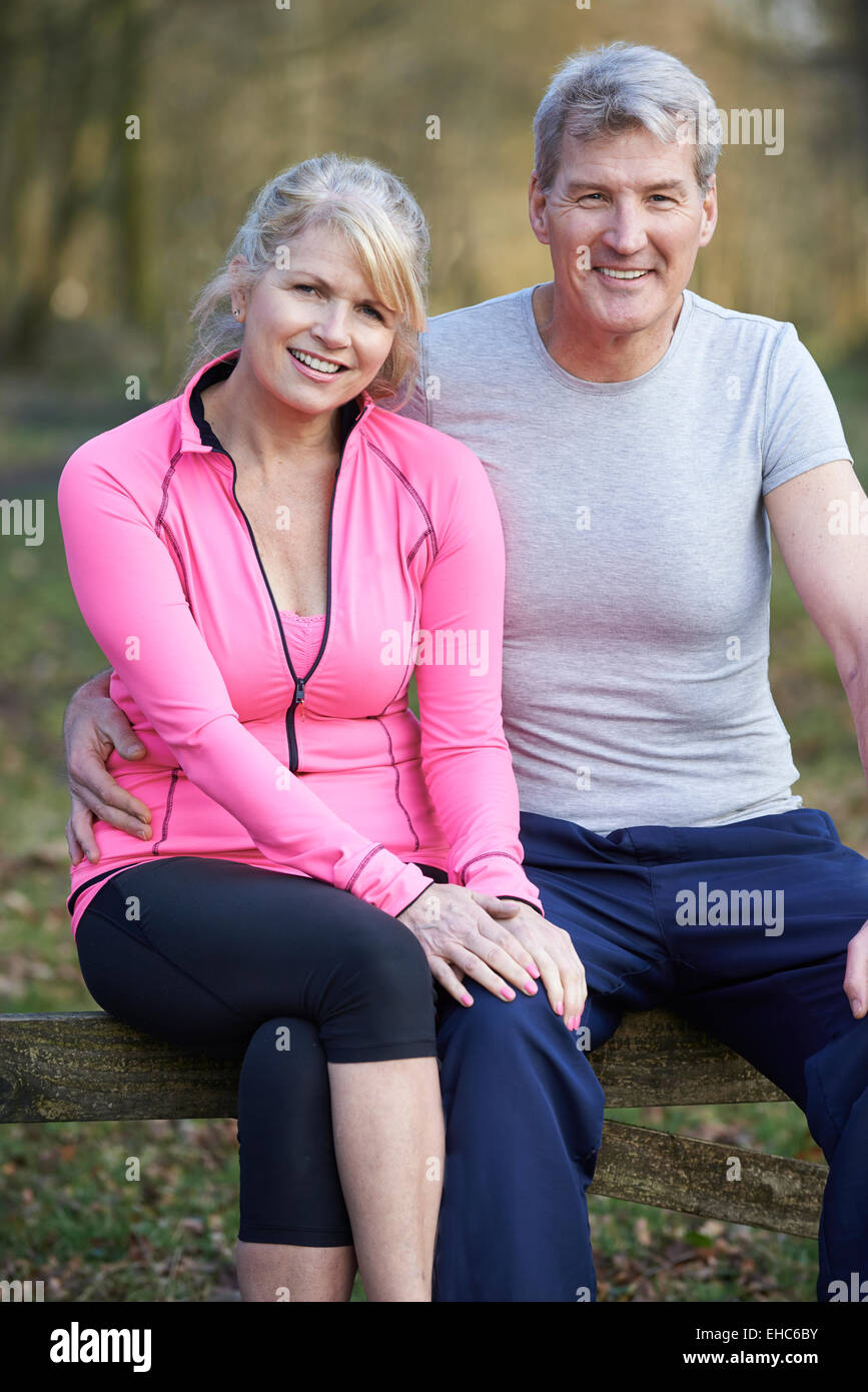 Mature Couple Exercising In Countryside Together Stock Photo