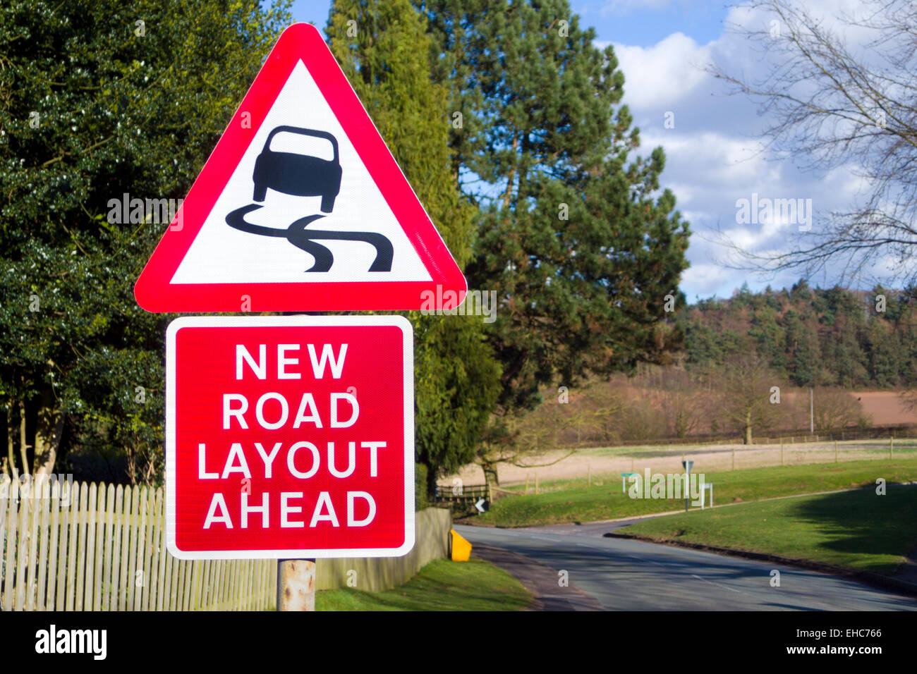 New Road Layout Ahead and Risk of Skidding Road Signs, UK Stock Photo