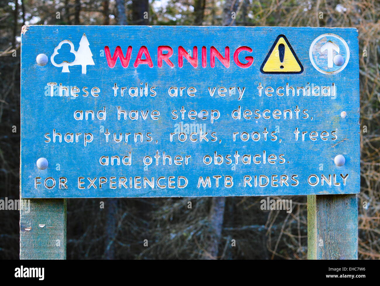 Mountain Bike trail warning sign in Innerleithen Forest, Scottish Borders. Stock Photo