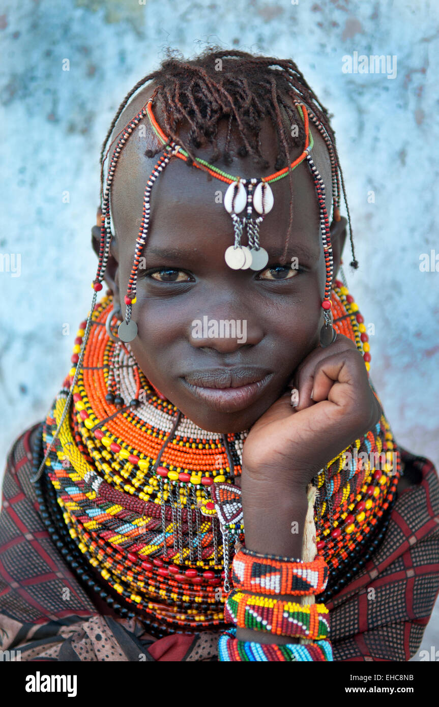 Turkana girl with massive colorful beaded necklaces and headdress ...