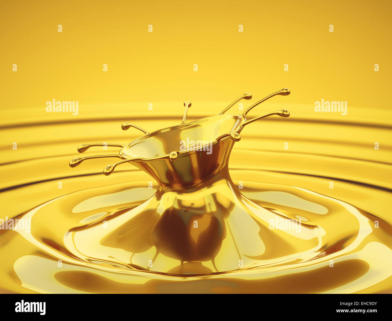 Splash of melted gold with droplets and waves. Large resolution Stock Photo