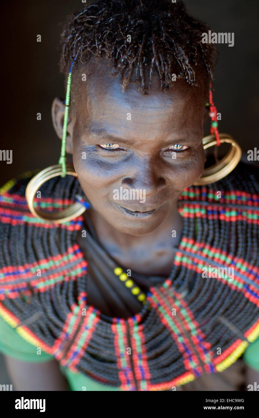 A Pokot woman with massive beaded necklace collier ad brass rings, Tengulbei, Kenya Stock Photo