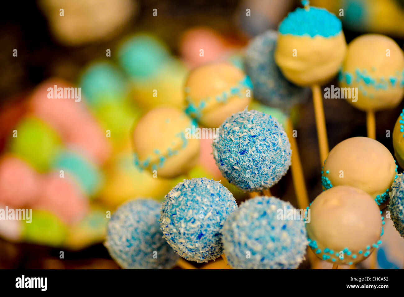 Many candies arranged in a glass bowl at a party Stock Photo