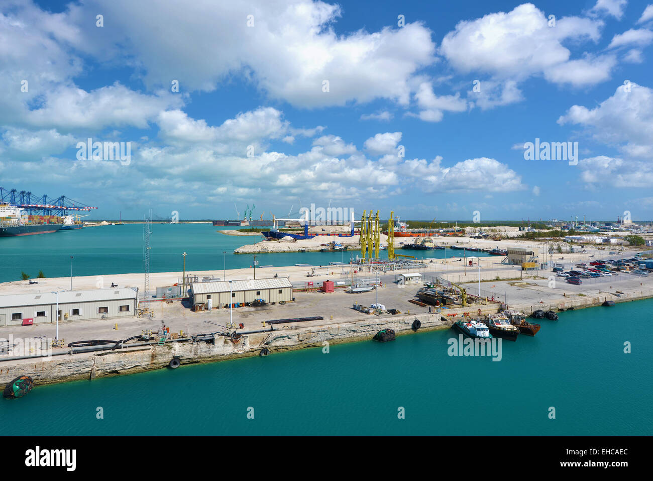 Industrial view in Freeport - Bahamas. A lot of ships and cranes ready for work. Stock Photo