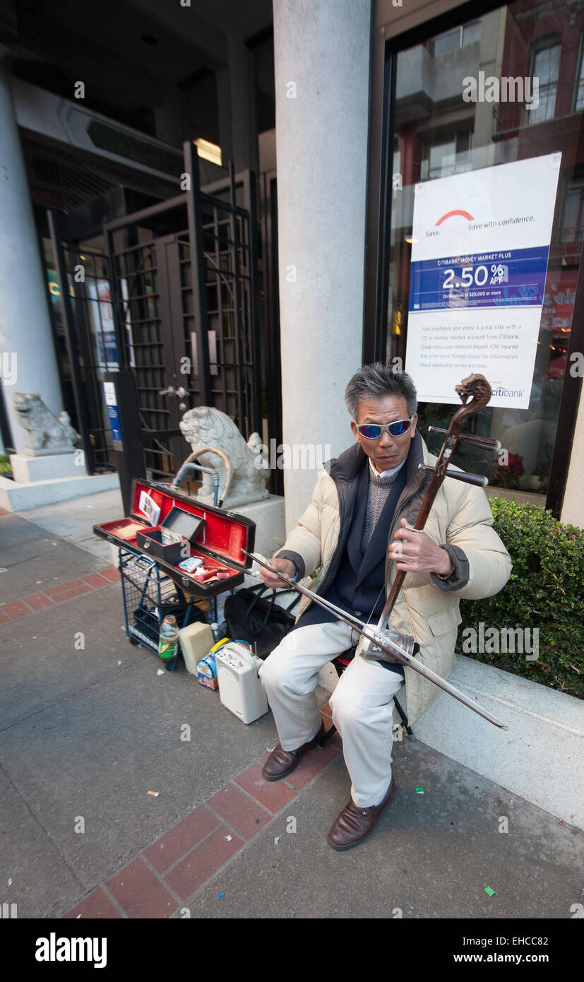 Street performer in Chinatown, San Francisco. Stock Photo