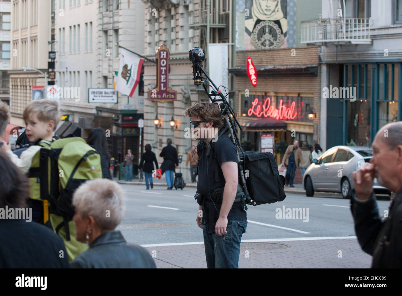 Man with camera and mapping backpack in San Francisco. Stock Photo