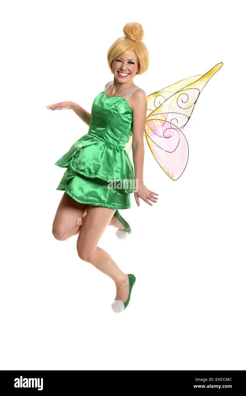 Portrait of young woman in costume and wings isolated over white background Stock Photo