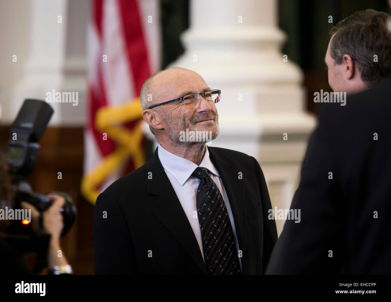 British pop singer Phil Collins accepts the title of Honorary Texan from the Texas Legislature at ceremony at the State Capitol Stock Photo
