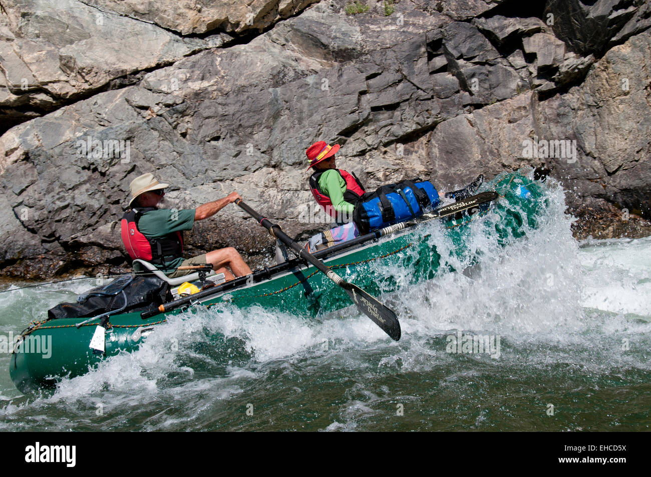 Rafter rowing through Upper Cliffside Rapid (class IV) on the Middle Fork of the Salmon River, Idaho Stock Photo